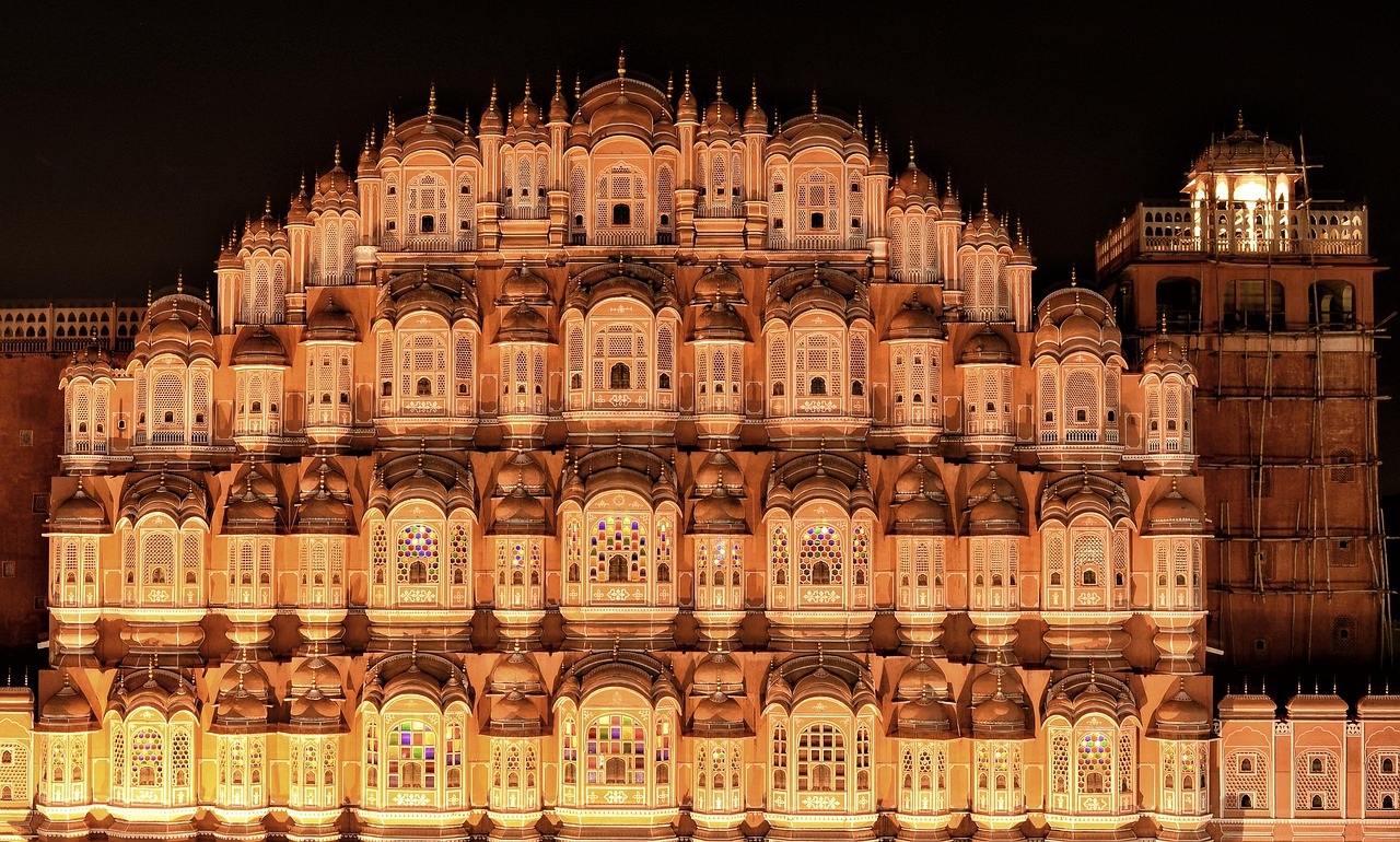 The Hawa Mahal palace illuminated at night in Jaipur, India.